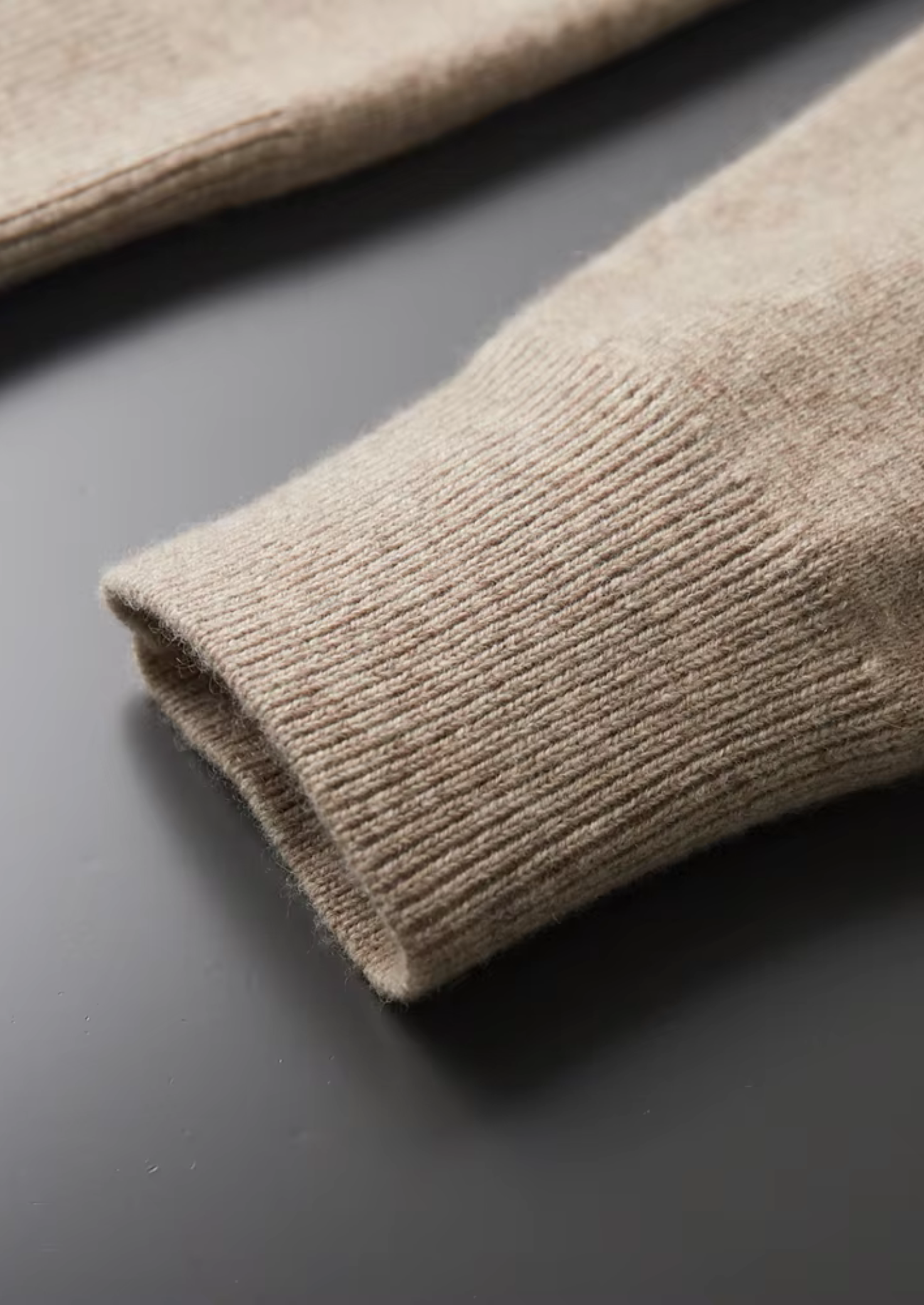 Polo zippé en laine mérinos extra-fine