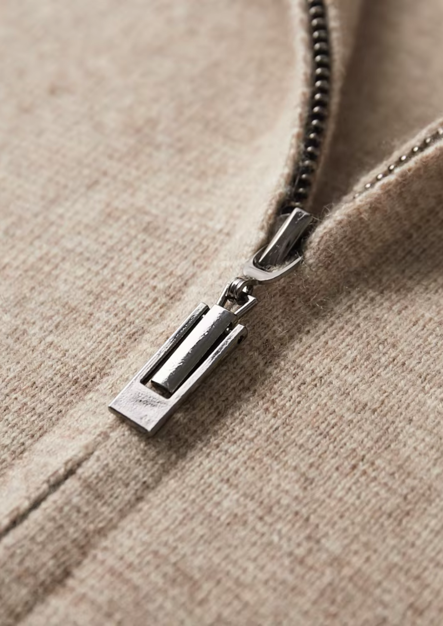 Polo zippé en laine mérinos extra-fine