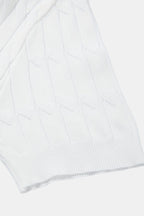 Polo Premium à col en V et tricot torsadé