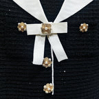 Robe tricotée à nœuds